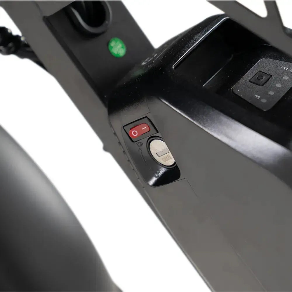 QMWheel S20 Pro fatbike in black, detail of the battery with on/off switch and lock