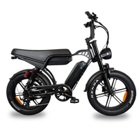 QMWheel V29 Pro Dual Battery fatbike in black, full side view with long saddle, battery in the frame and Kenda tyres